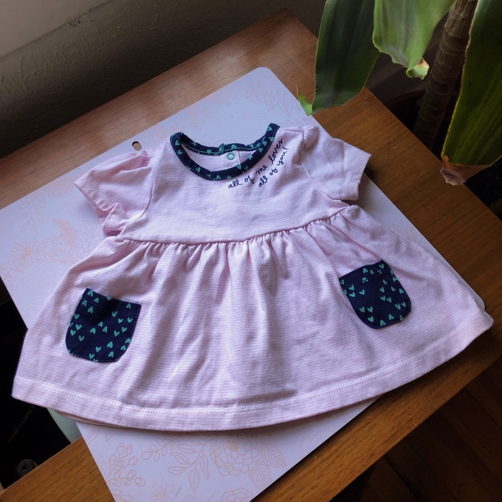 Pink striped babydoll style dress with pockets